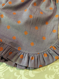 Tigers embroidered tee and orange paw print ruffle shorts set