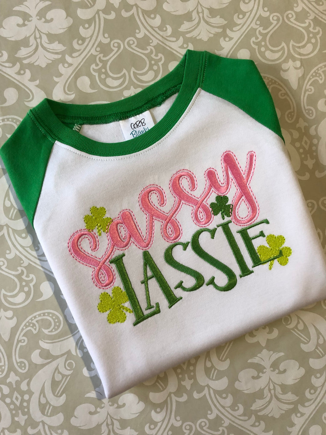Sassy Lassie shamrock embroidered raglan tee