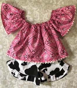 Off the shoulder pink bandanna top with cow print ruffle shorts
